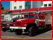 fire trucks outside of fire station